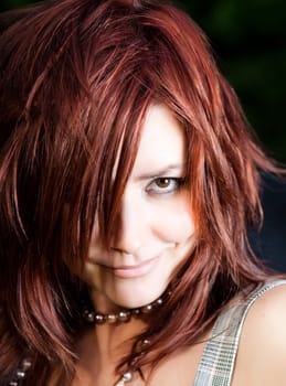 Woman With Red Hair. Close-Up Portrait