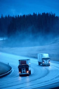 two auto tracks on the road