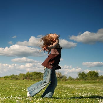 Young girl having fun in a park