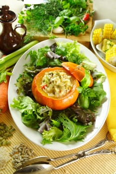 Baked golden nugget pumpkin with rice stuffing ready to serve.