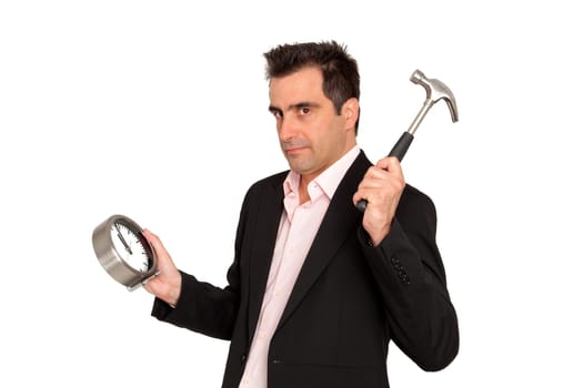 Young businessman nervous, he tries to breaks the clock of his work and making grimaces