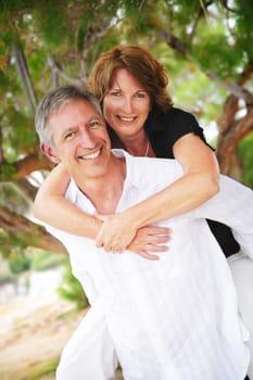 beautiful mature couple in love having fun outdoors