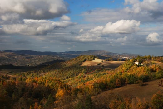 Warm autumn sun light over center italy apennines