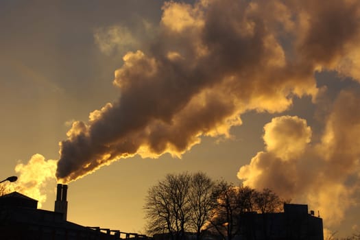 Dirty air pollution with a sunset on the background