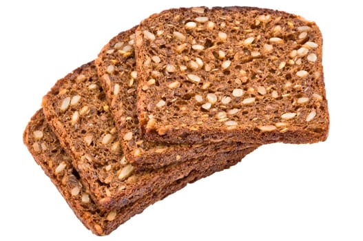 Black bread with sunflower seeds of a rough grinding cut by pieces on a white background