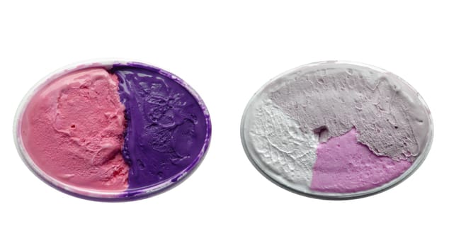 Strawberry and blueberry icecream isolated over a white background