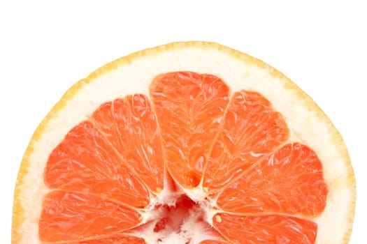 A fresh grapefruit isolated on white background. Shallow depth of field