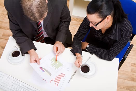 Business man and business woman working in office