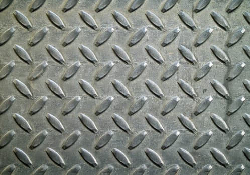 Diamond metal background texture illuminated by sunlight