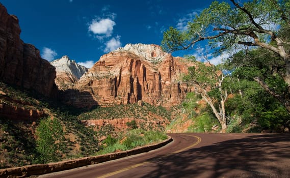 Road through the red rocks of Zion National Park, Utah