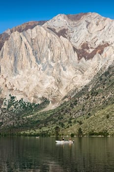 Boats fishing for trout in Convict Lake, California