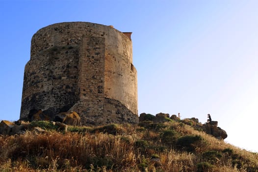 tourists taking pictures on tharros hill tower