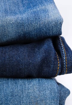 Stack of jeans paints