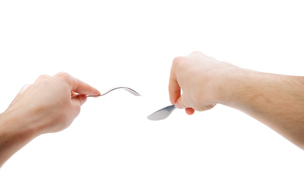 Isolated human hands with dinner equipments