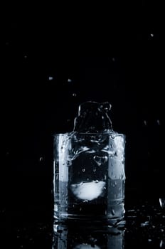 Glass of splashing water