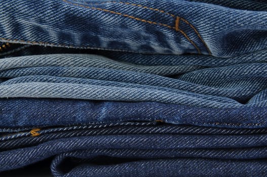 Stack of jeans paints