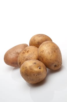 Some potatoes over white
