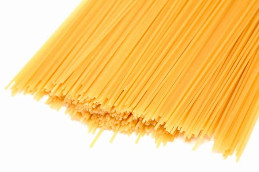 Spaghetti scattered on a white background. Isolated object.