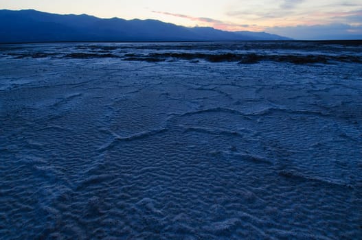 cracked desert earth in Death Valley National Park, CA