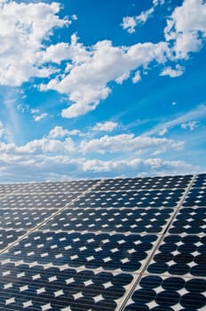 solar panel with beautiful blue sky and clouds in background