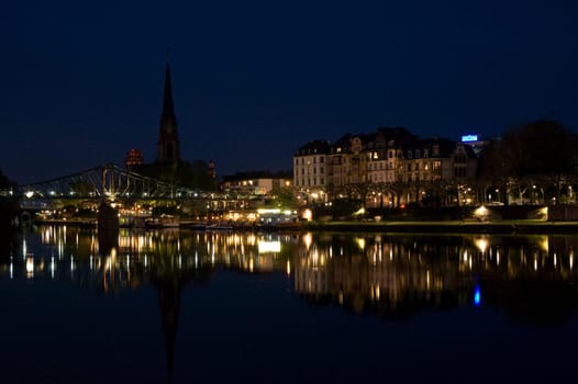 nightshot of frankfurt city including bridges and scyscrapers