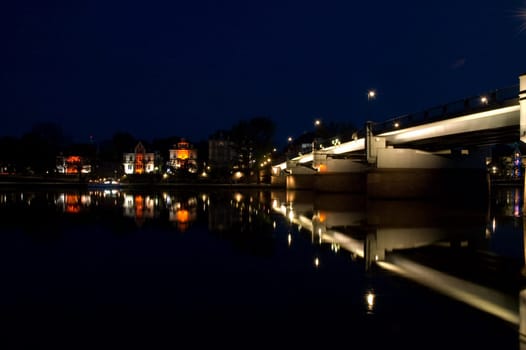 nightshot of frankfurt city including bridges and scyscrapers