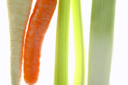 Celery, leek, carrot, transparent over white studio background