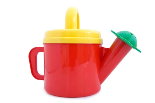Toy watering can. Isolated on white background.