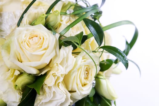 Wedding bouquet with cream roses and green decoration