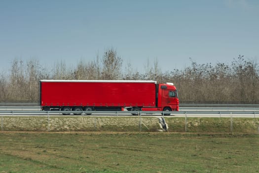 Red truck going on the highway