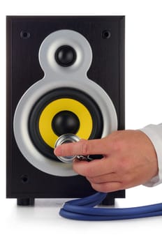 male hand, phonendoscope  and loud speaker on white