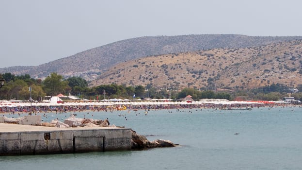 A remote view of the beach and waterfront in Varkiza, near Athens, Greece