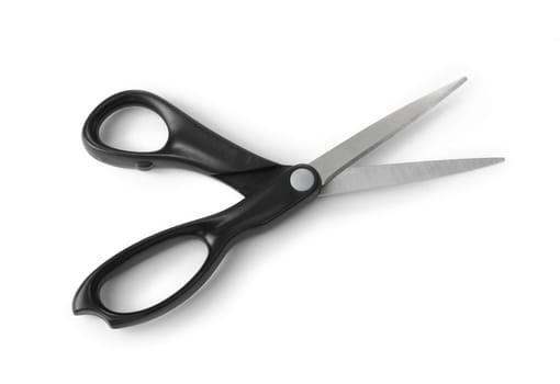 Pair of scissors over white background