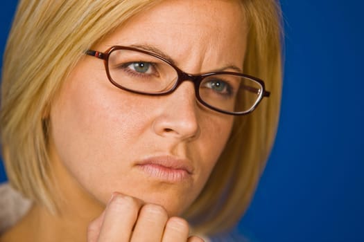 Confused, pretty young woman