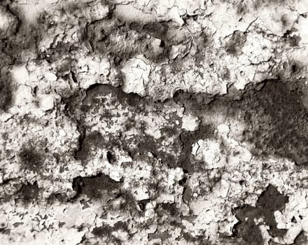 Painted wall with cracks monochrome background