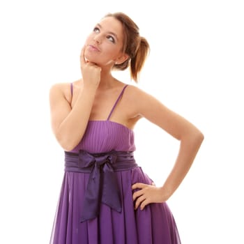 Attractive dancer girl in violet classic dress, studio shot