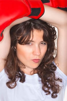 sport - young woman with red boxing gloves