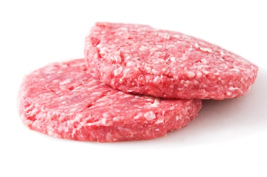 raw hamburger isolated on white background