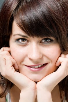 Young brunette girl smiling