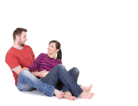 young loving couple together on white background