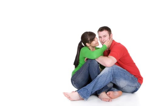 young loving couple together on white background