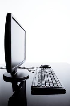 Desktop computer wit mouse and keyboard and monitor