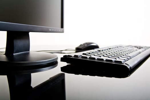 Desktop computer wit mouse and keyboard and monitor