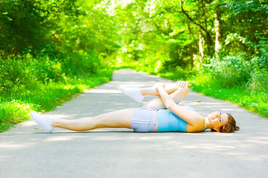 Young woman exercising, from a complete series of photos.