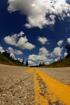 Interstate road with blue mackerel sky
