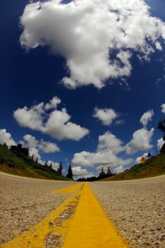Interstate road with blue mackerel sky