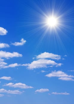 Bright sun in the blue sky