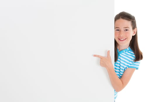 Cute Caucasian girl holding a blank sign