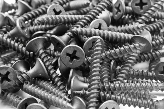 Screws and driver assorted with white background