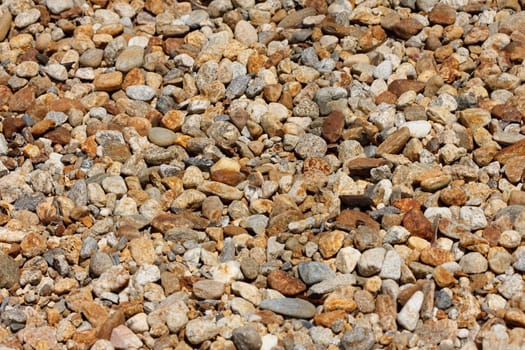 A bed of gravel, made of small rounded stones.